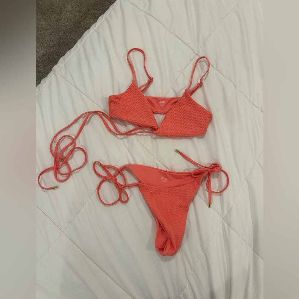 Used once Monday bikini. Top is medium & bottoms are size large (they run small)